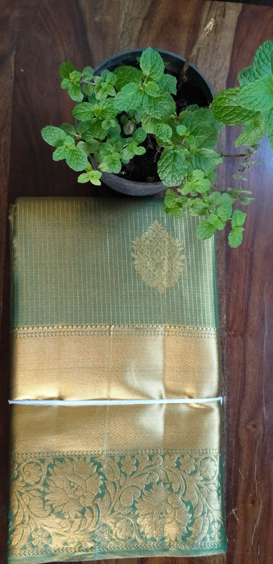 Mehndi Green Gold Striped Saree with Golden Zari Butta & Wide Border - Body Display on Table