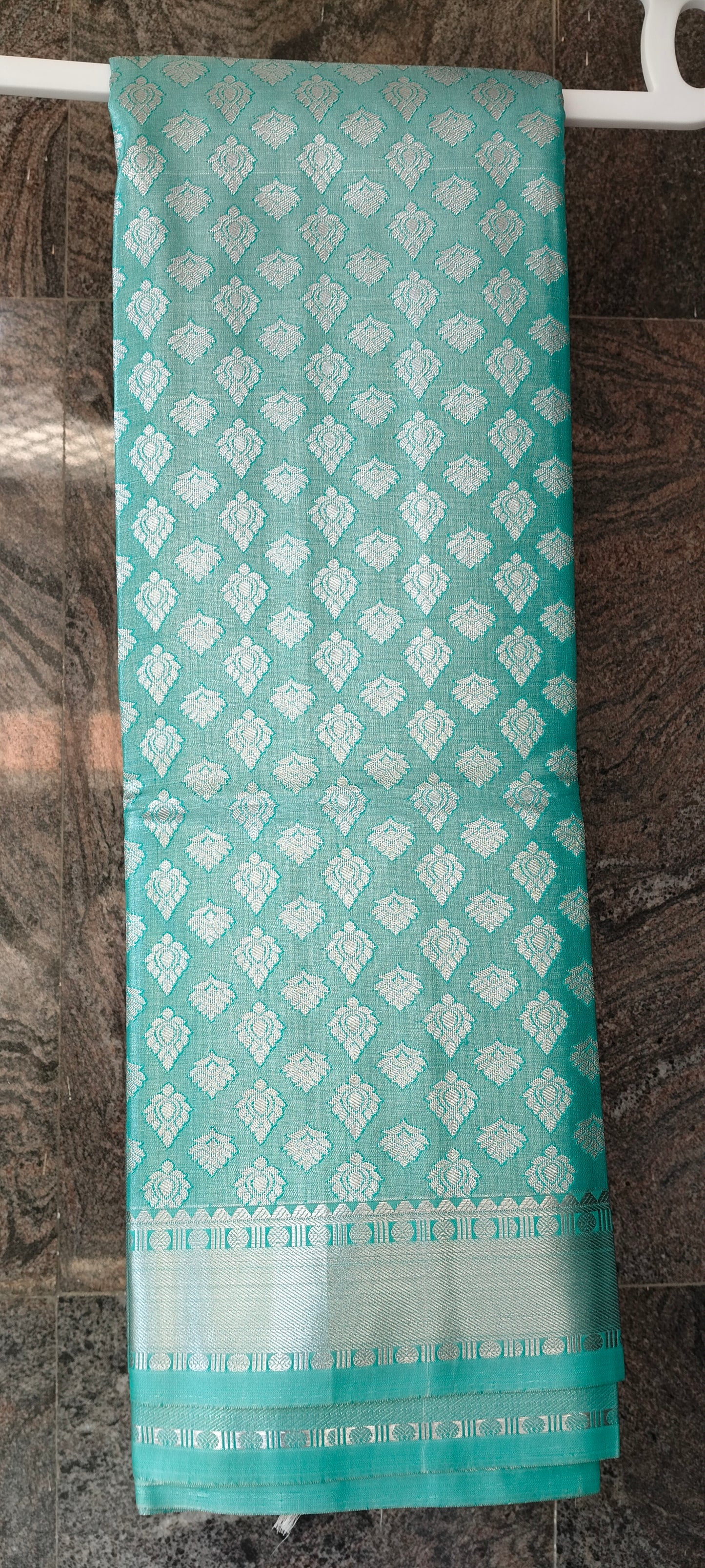 Mint Green Brocade Semi-Silk Saree with Silver Tissue Border - Saree on Hanger with Border Detail