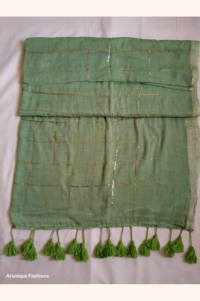 Trendy sage green sequin mul cotton saree - folded view showing fabric drape and texture