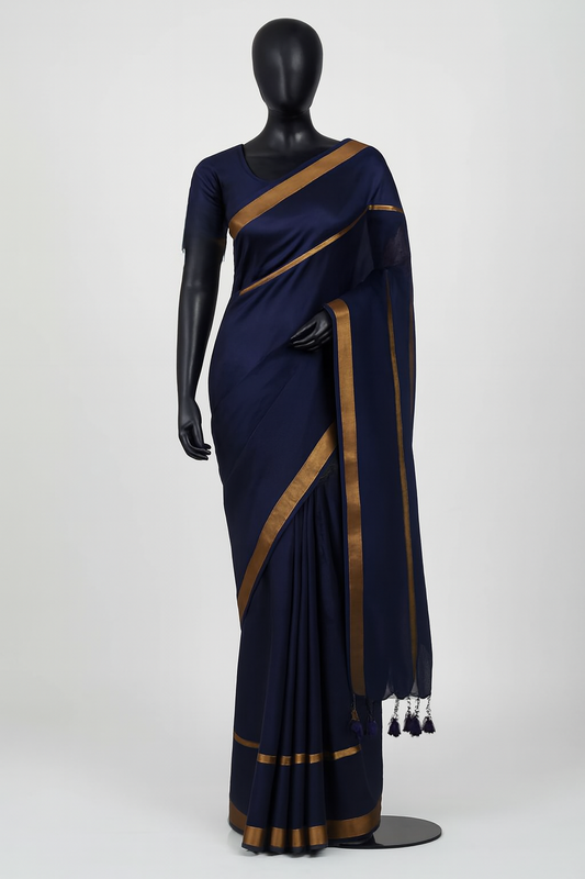 Navy blue double zari mul cotton saree displayed on mannequin showing elegant drape with dual golden borders