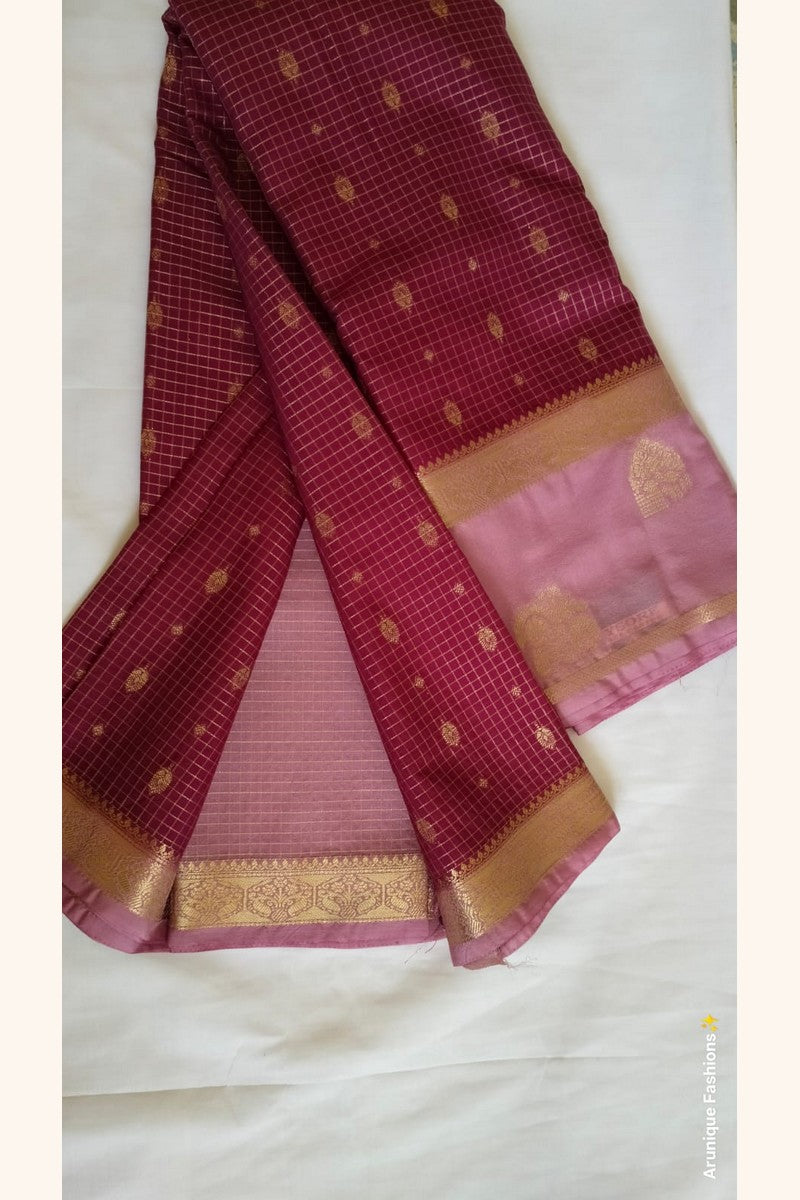 Lilac pink blouse piece with gold zari border – maroon crepe silk saree – Arunique Fashions