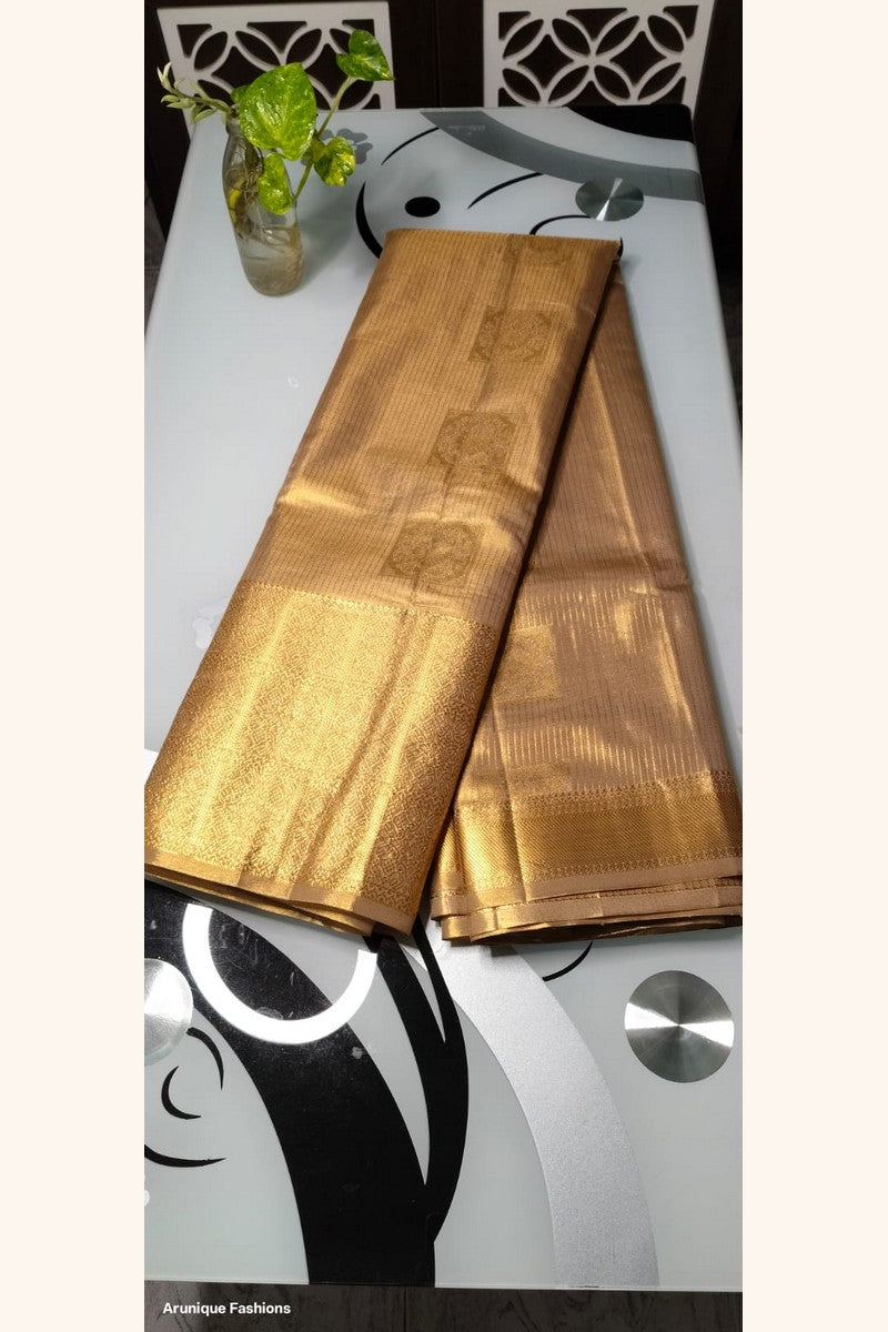 Pale Gold Shimmer Semi-Silk Saree - Saree Display on Glass Table
