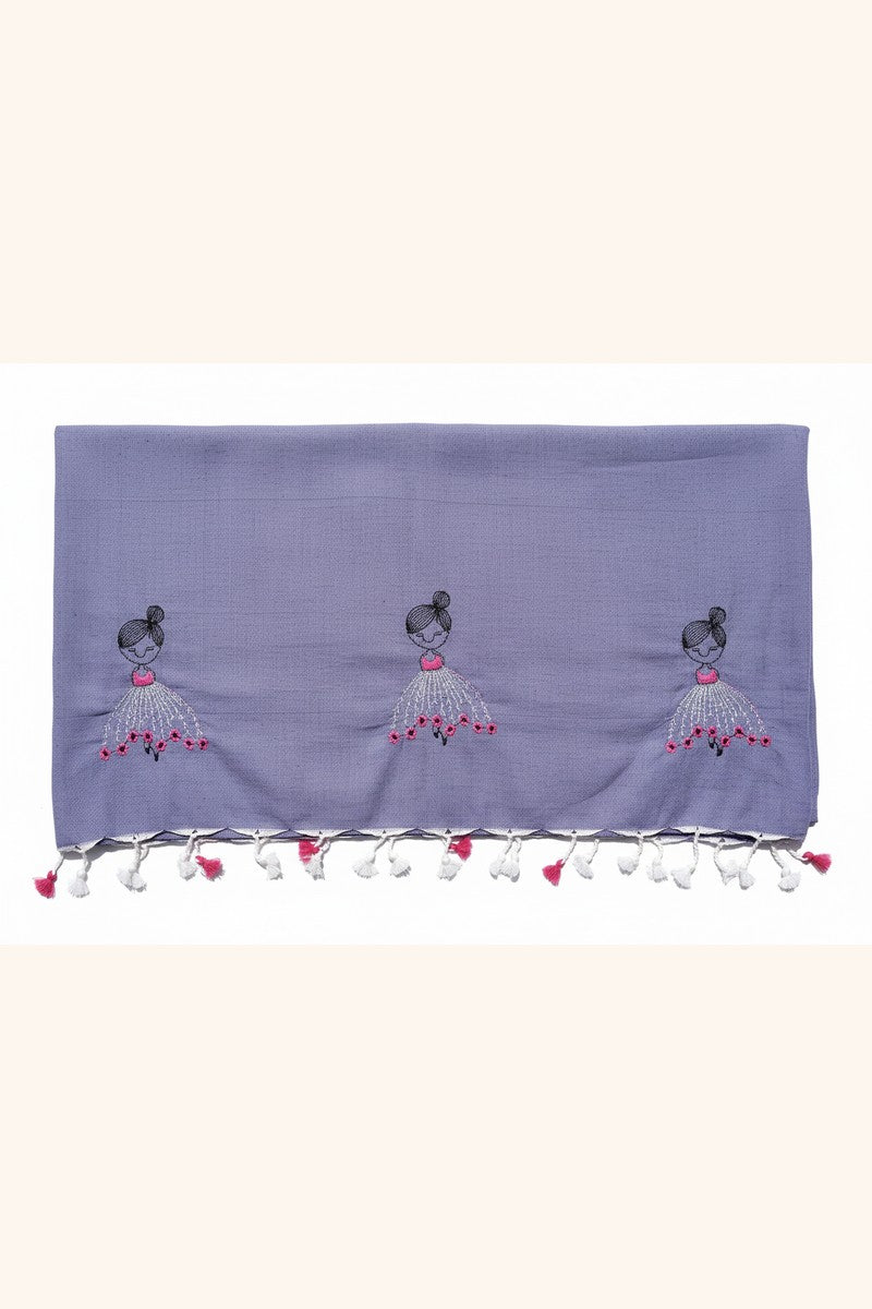 Close-up of embroidered baby doll motif fabric texture on pearl grey khadi