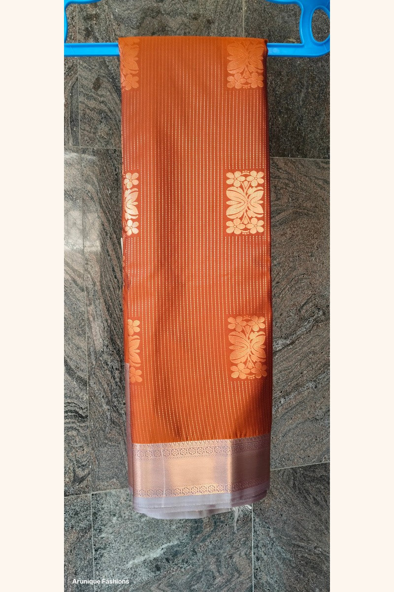 Rust Orange Golden Shimmer Semi-Silk Saree - Saree on Hanger with Border Detail