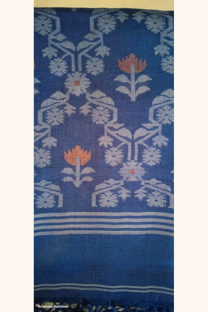 Navy blue ikat pallu of Pure Tussar Silk Saree with dense lotus floral weave in silver-white and orange with two-toned tassels