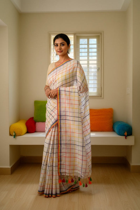 Model wearing off-white rainbow checks mul cotton saree in full drape