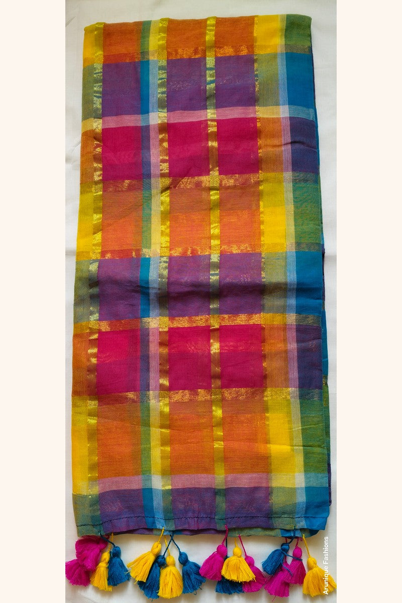 Close-up of multicolor zari rainbow checks fabric on white background