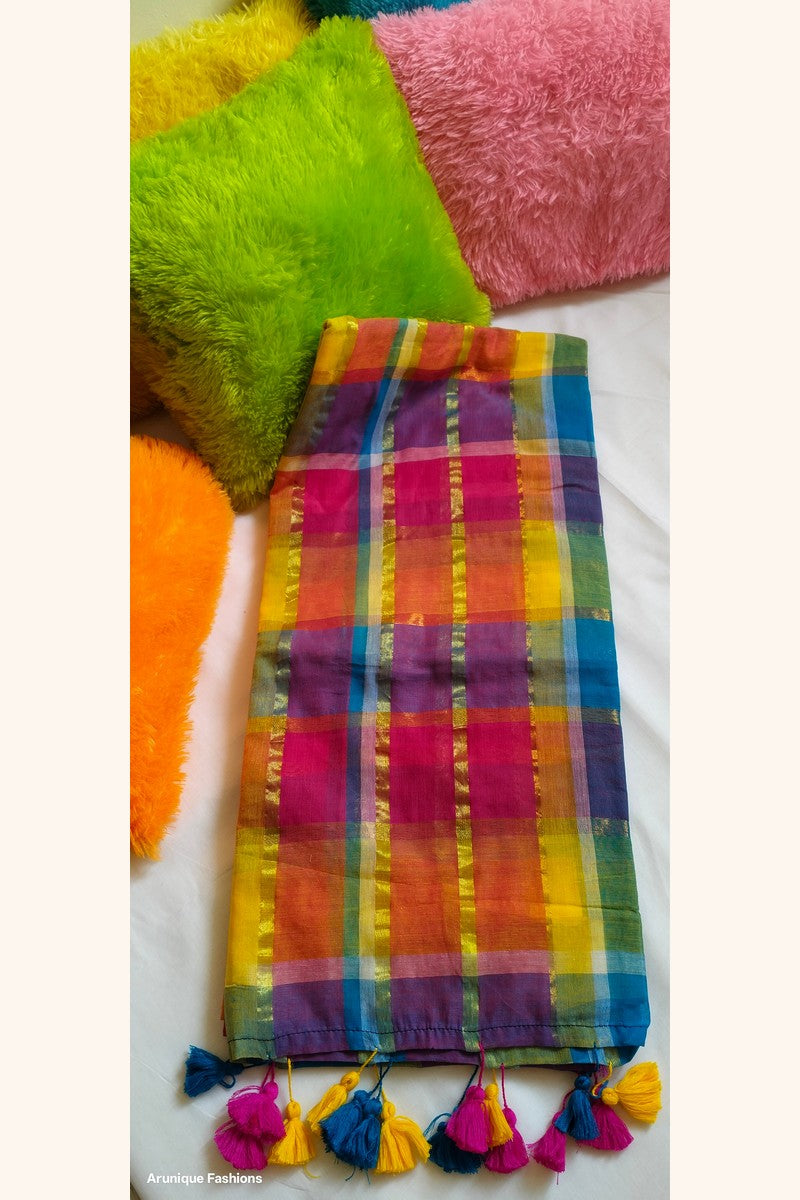 Multicolor zari rainbow checks saree displayed with pillows