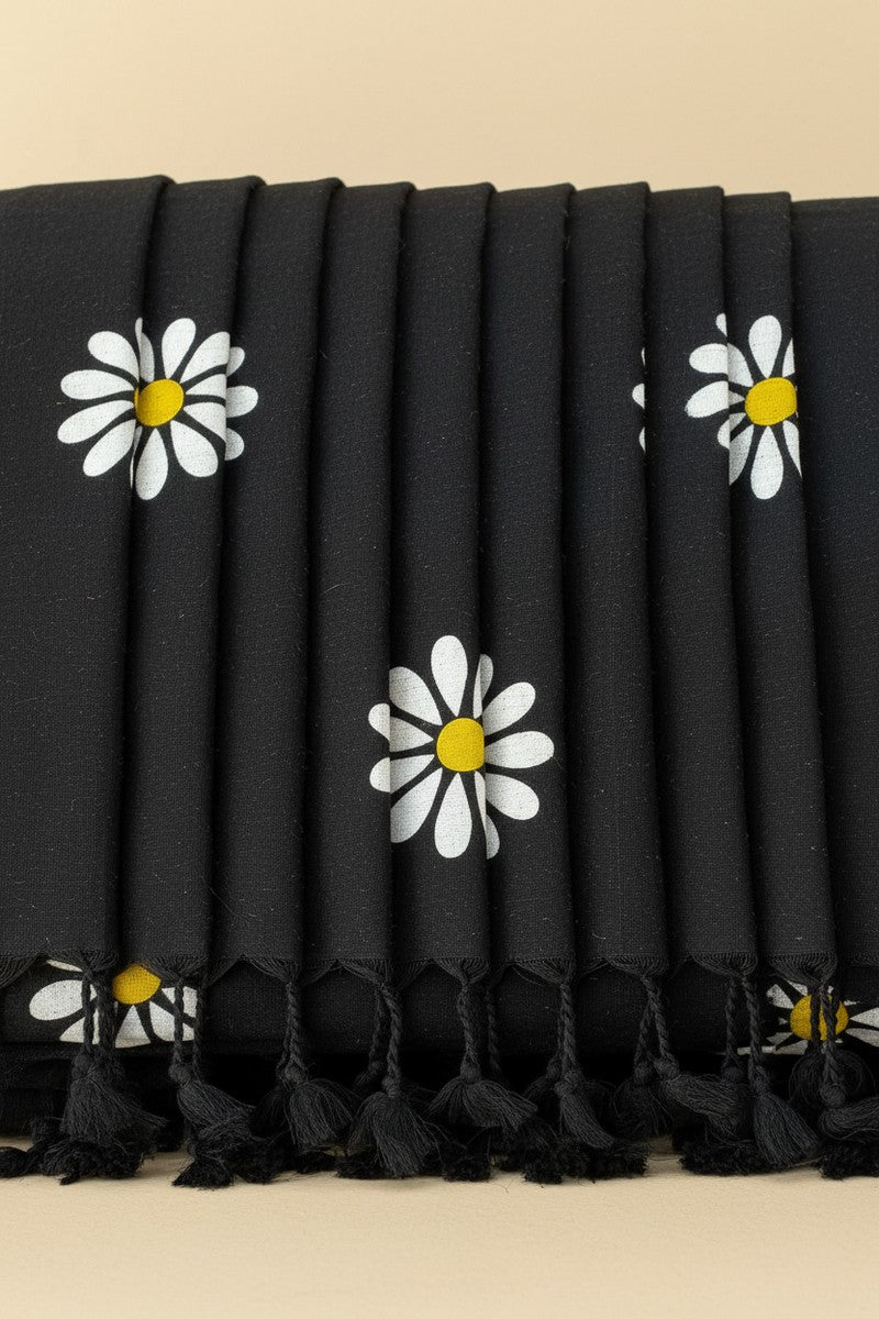 Pleats detail with black tassels on black sunflower khadi saree