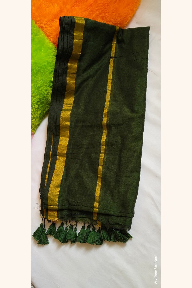 Enhanced view of dark green mul cotton saree with double golden zari borders and traditional tassels