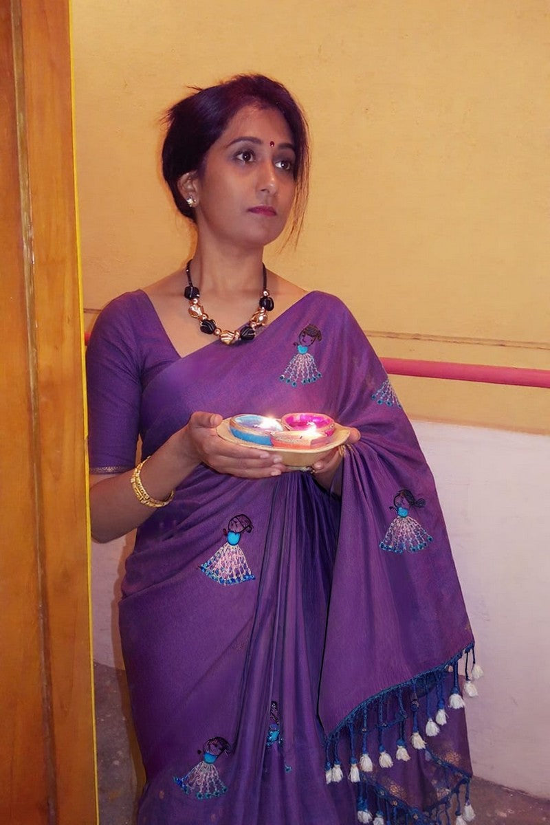 Model wearing dual shade purple baby doll khadi saree vibrant design