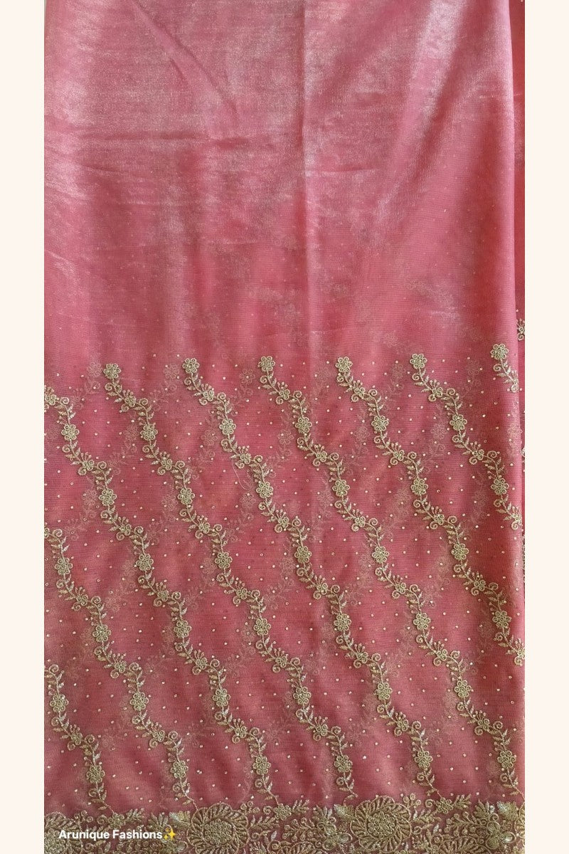 Dusty rose designer net saree body view with plain upper half and diagonal gold zari embroidery on lower half – Arunique Fashions