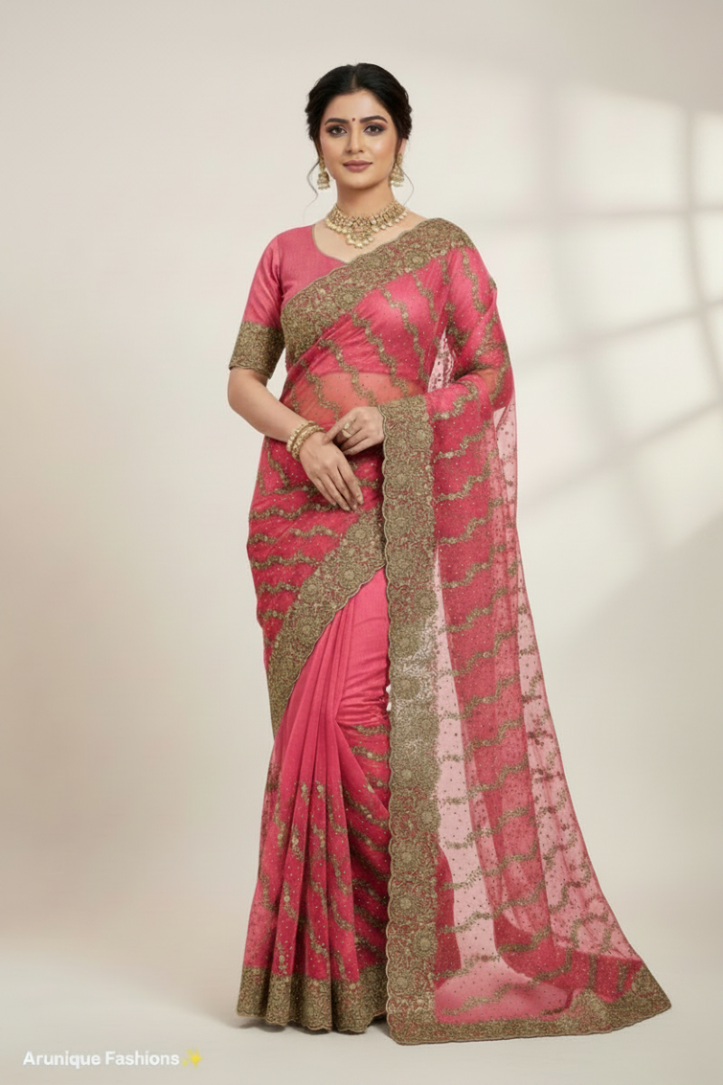Dusty rose designer net saree full drape model shot with gold zari embroidered pallu and scalloped border – Arunique Fashions