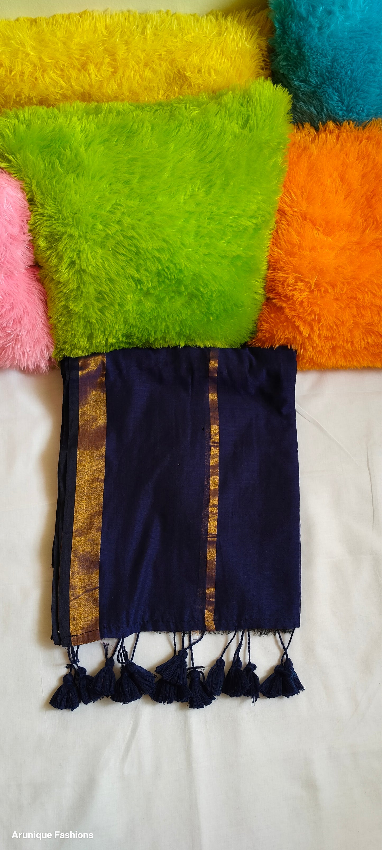 Navy blue double zari mul cotton saree - draped view showing dual golden borders and blue tassels