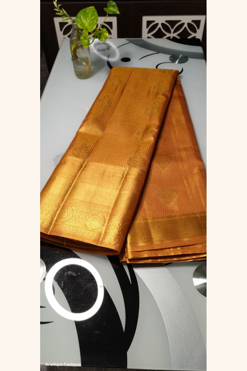 Golden Mustard Semi-Silk Saree - Saree Display on Glass Table
