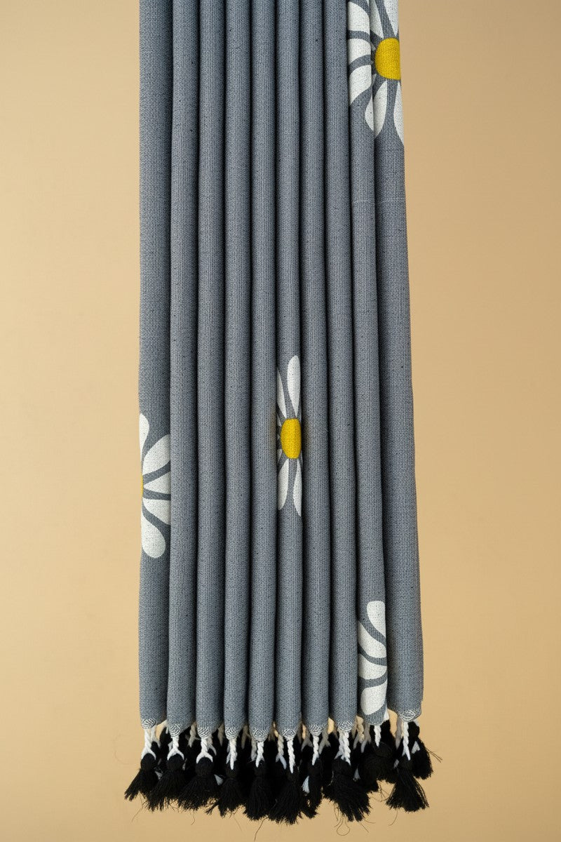 Pleats detail with black tassels on grey sunflower khadi saree