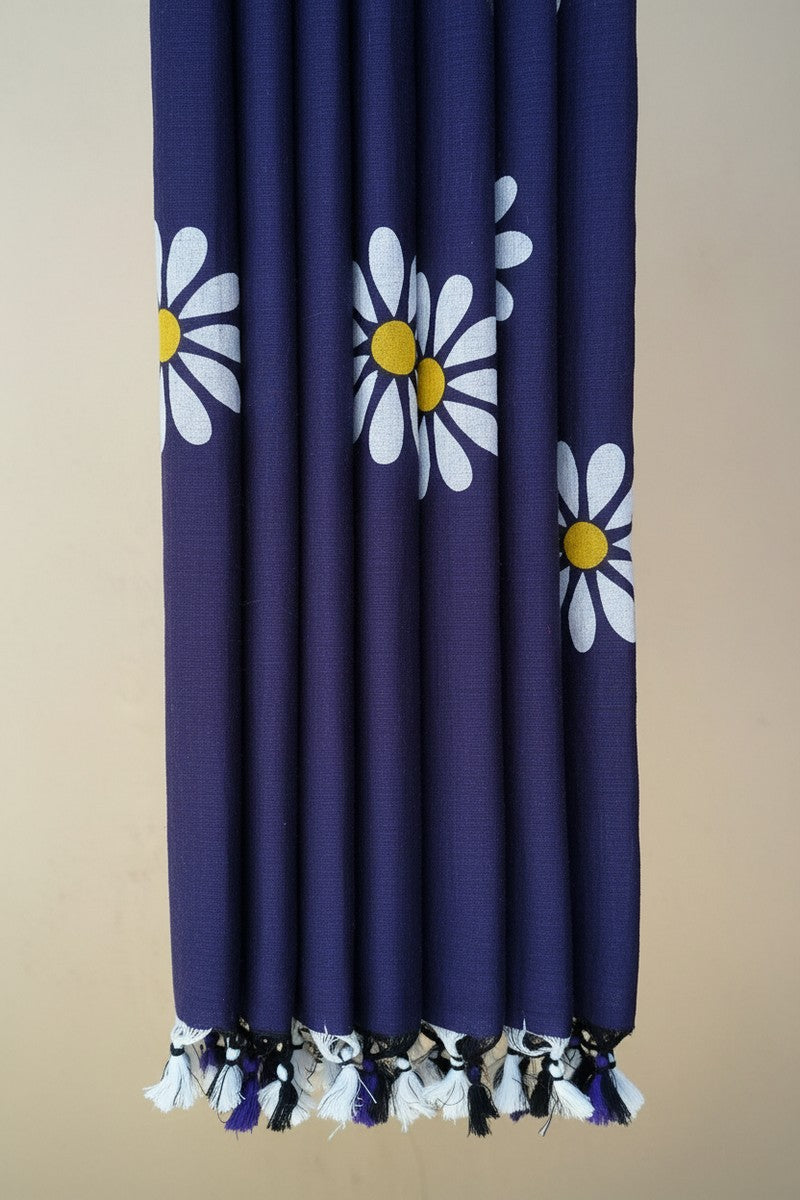 Pleats detail with blue and white tassels on indigo blue sunflower khadi saree