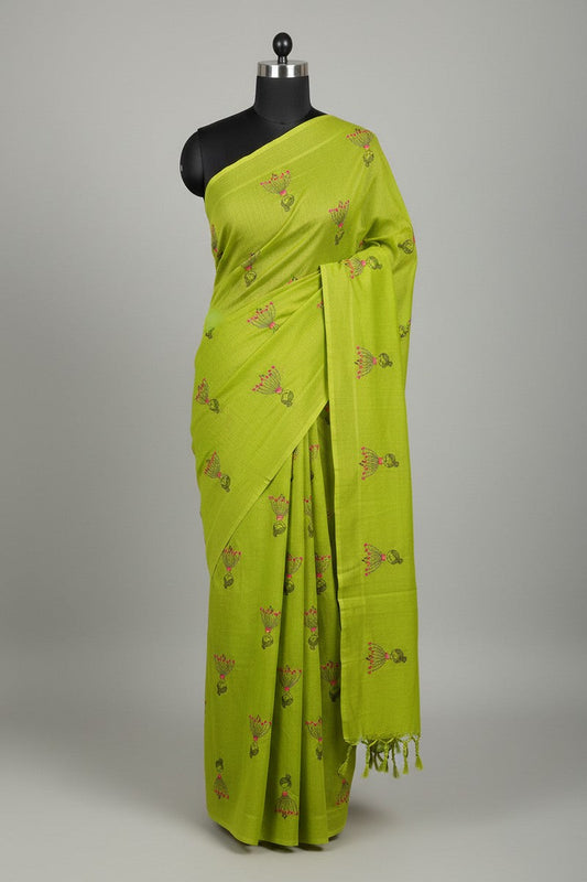 Mannequin display of lime green baby doll khadi saree with evenly spaced motifs