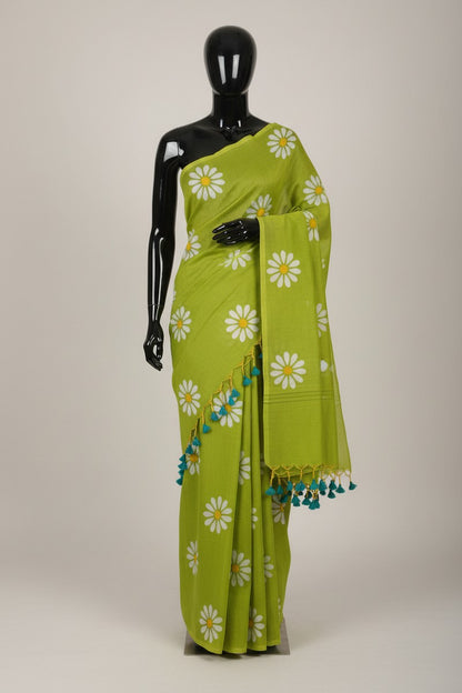 Lime green sunflower khadi saree displayed with yellow and teal tassels