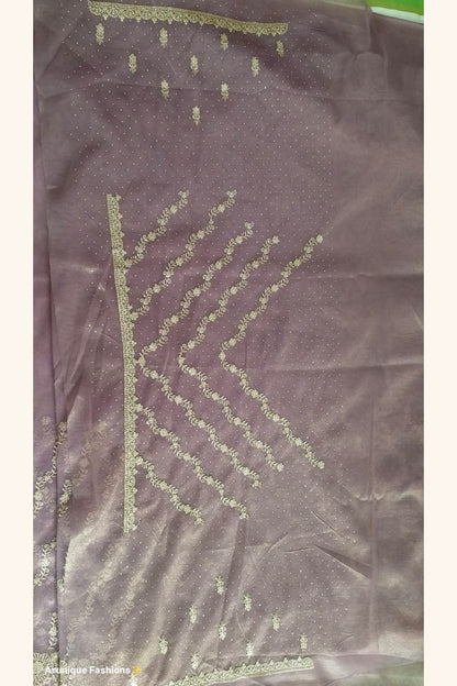 Mauve premium designer net saree - blouse spread showing gold zari floral motifs and heavy scalloped gold border