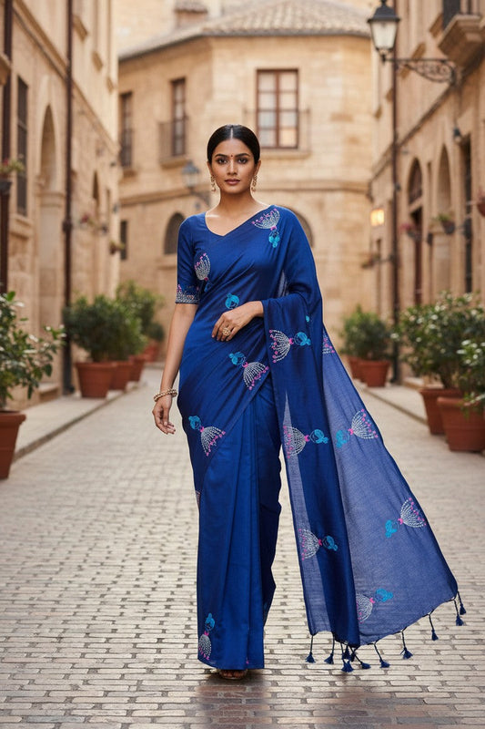 Model walking down street in royal blue baby doll khadi saree