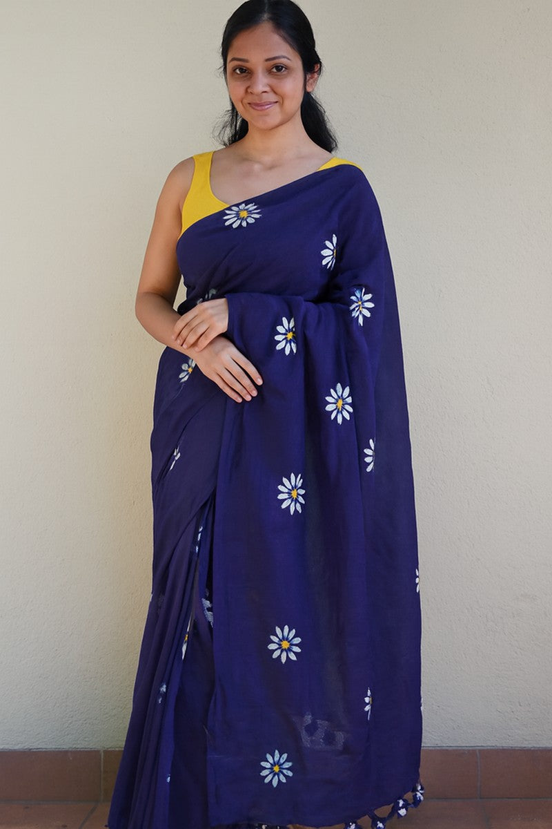 Model wearing indigo blue sunflower print khadi saree in elegant drape