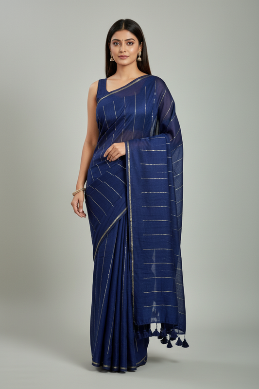 Model wearing navy blue saree with consistent vertical sequin pattern
