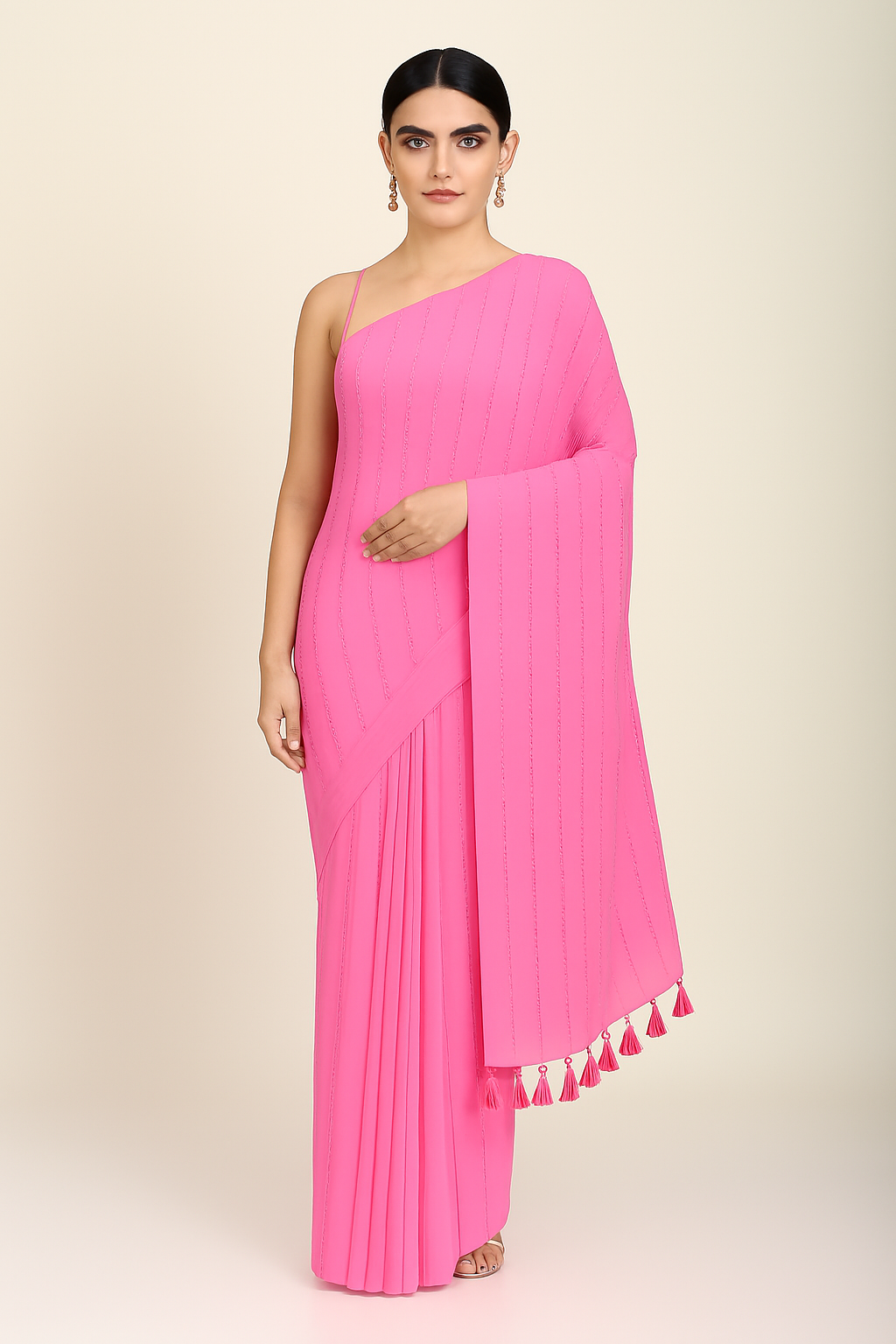Model wearing trendy pink mul cotton saree with sequin work