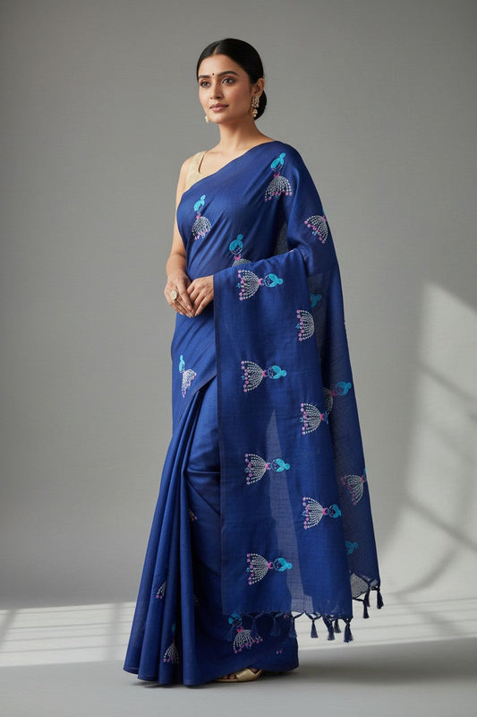 Model wearing royal blue baby doll khadi saree borderless design