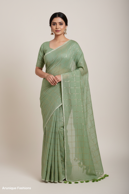 Model wearing trendy sage green mul cotton saree with sequins - 120 thread count premium fabric