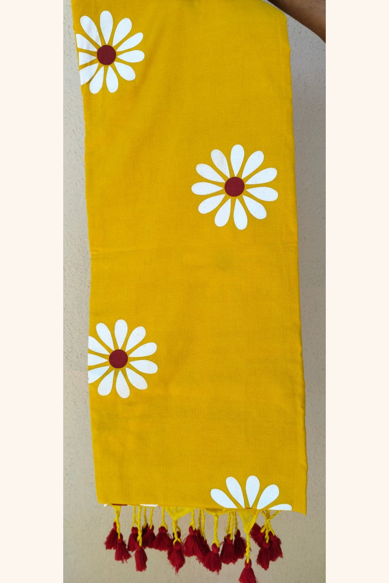 Close-up of block print texture on yellow sunflower khadi fabric