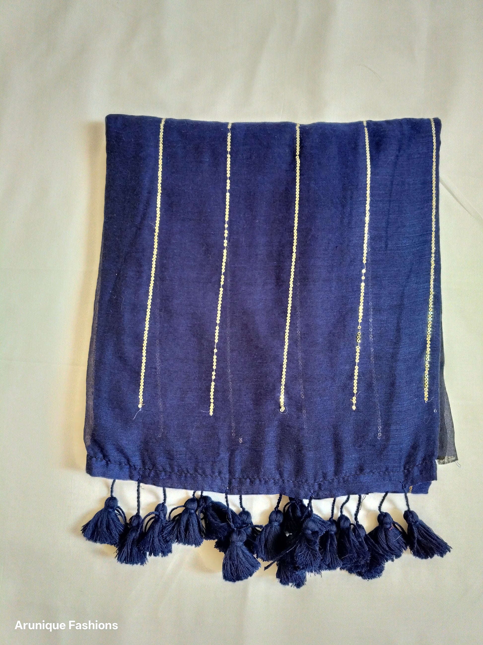 Navy blue mul cotton saree with vertical sequin work - full pallu view with hand-tied navy blue tassels