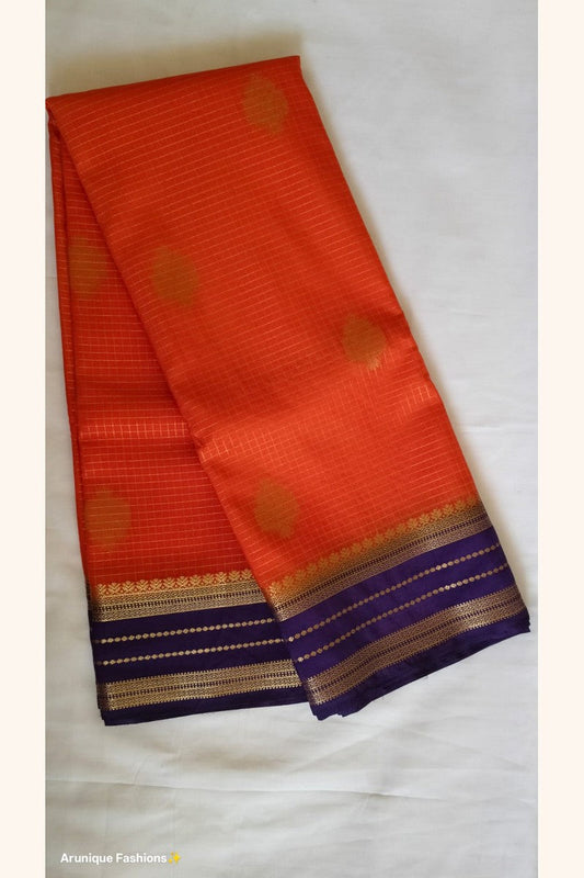 Orange crepe silk saree body with gold zari check weave and gold butta motifs – Arunique Fashions