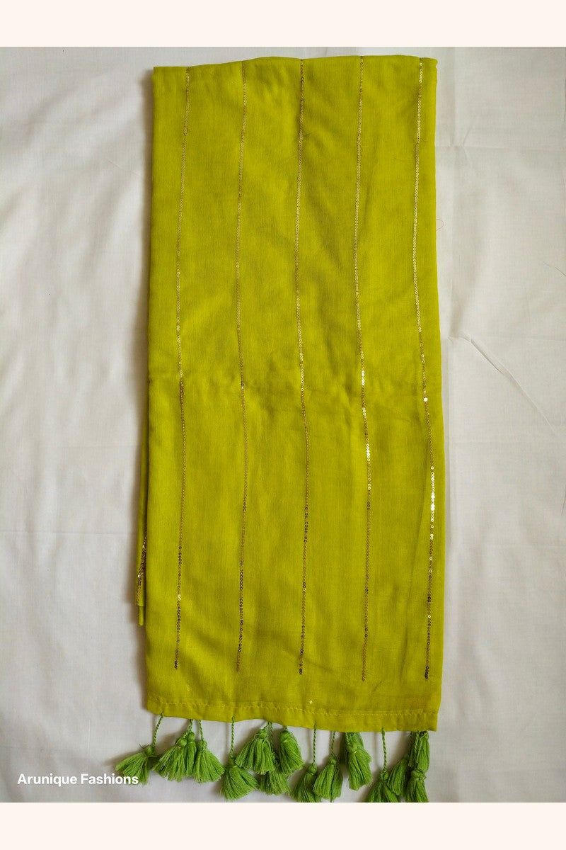 Lime yellow mul cotton saree with vertical sequin work - full pallu view with green tassels