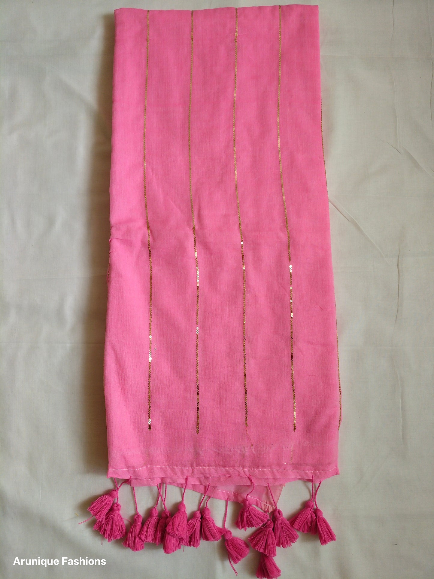 Pink mul cotton saree with sequins - full pallu view with decorative tassels