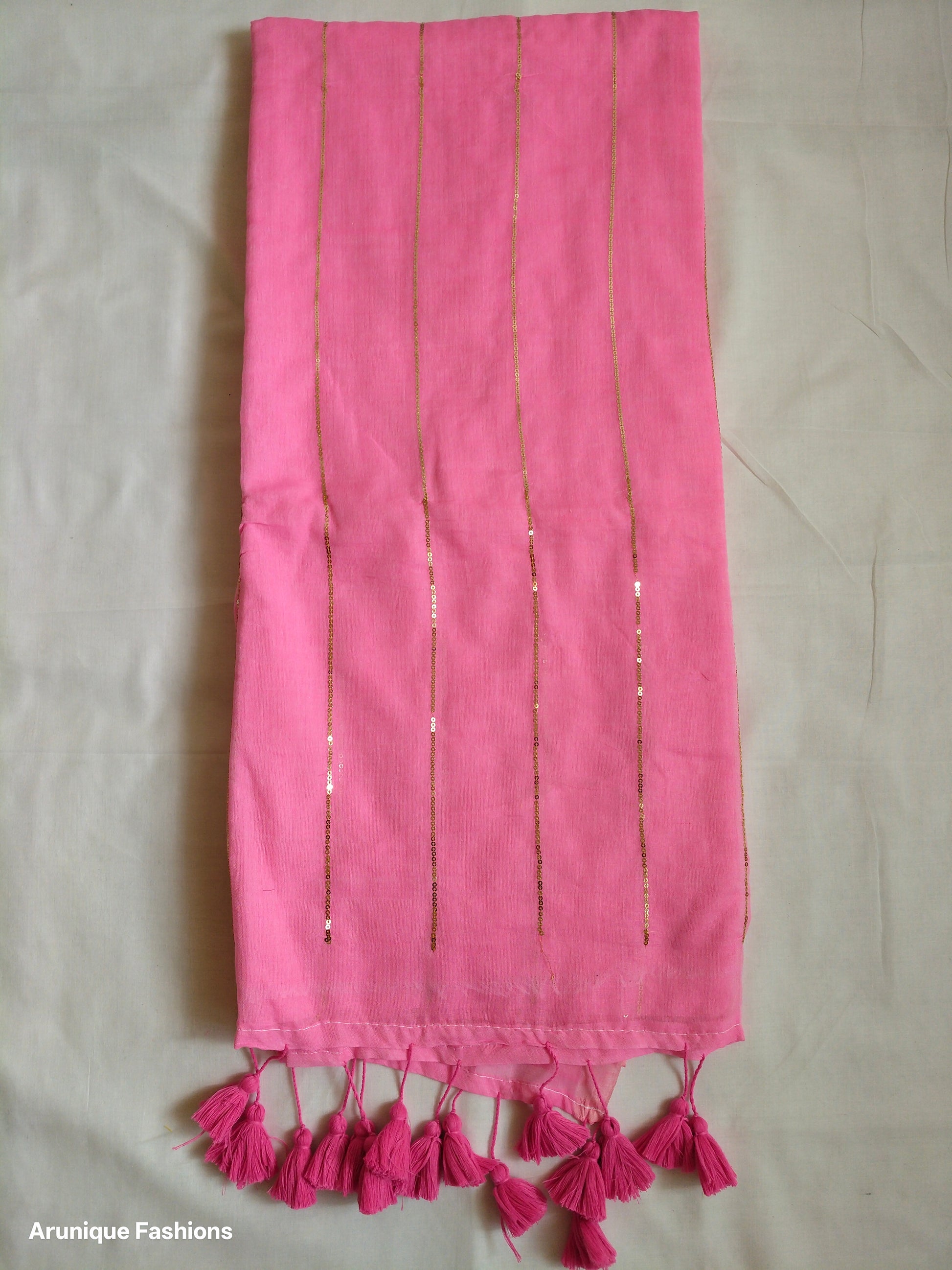 Pink mul cotton saree with sequins - full pallu view with decorative tassels