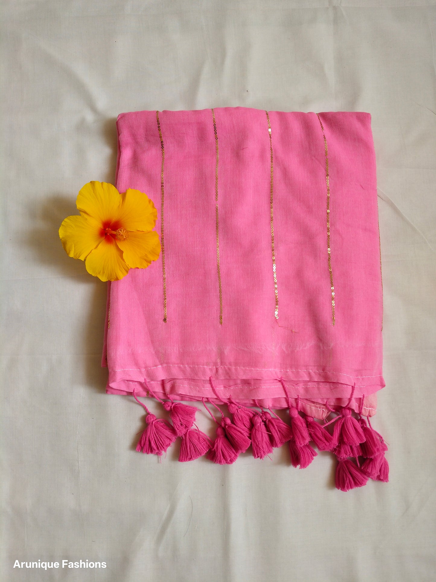 Pink mul cotton saree with sequin embellishment - fabric detail with decorative flower
