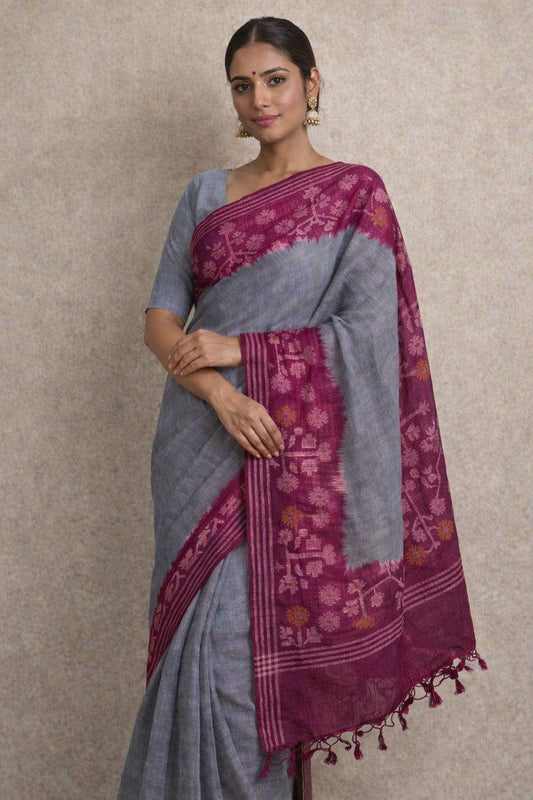 Pure Tussar Silk Saree steel blue body with magenta ikat border – model wearing full length Nivi drape