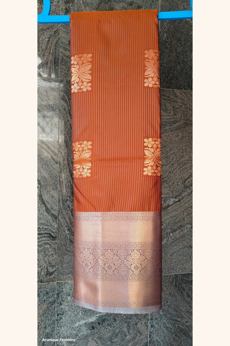 Rust Orange Golden Shimmer Semi-Silk Saree - Saree on Hanger with Wide Border Display