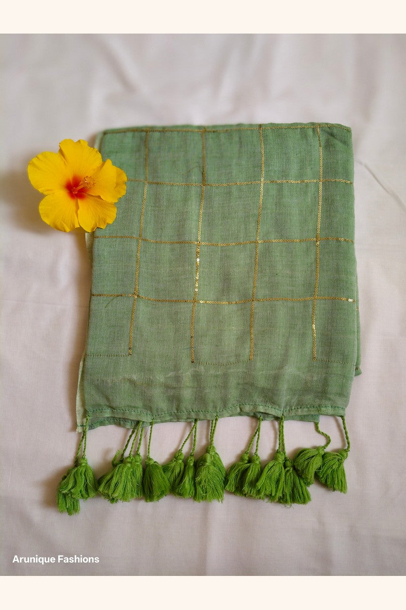 Sage green mul cotton saree with sequin embellishment - fabric detail with decorative flower