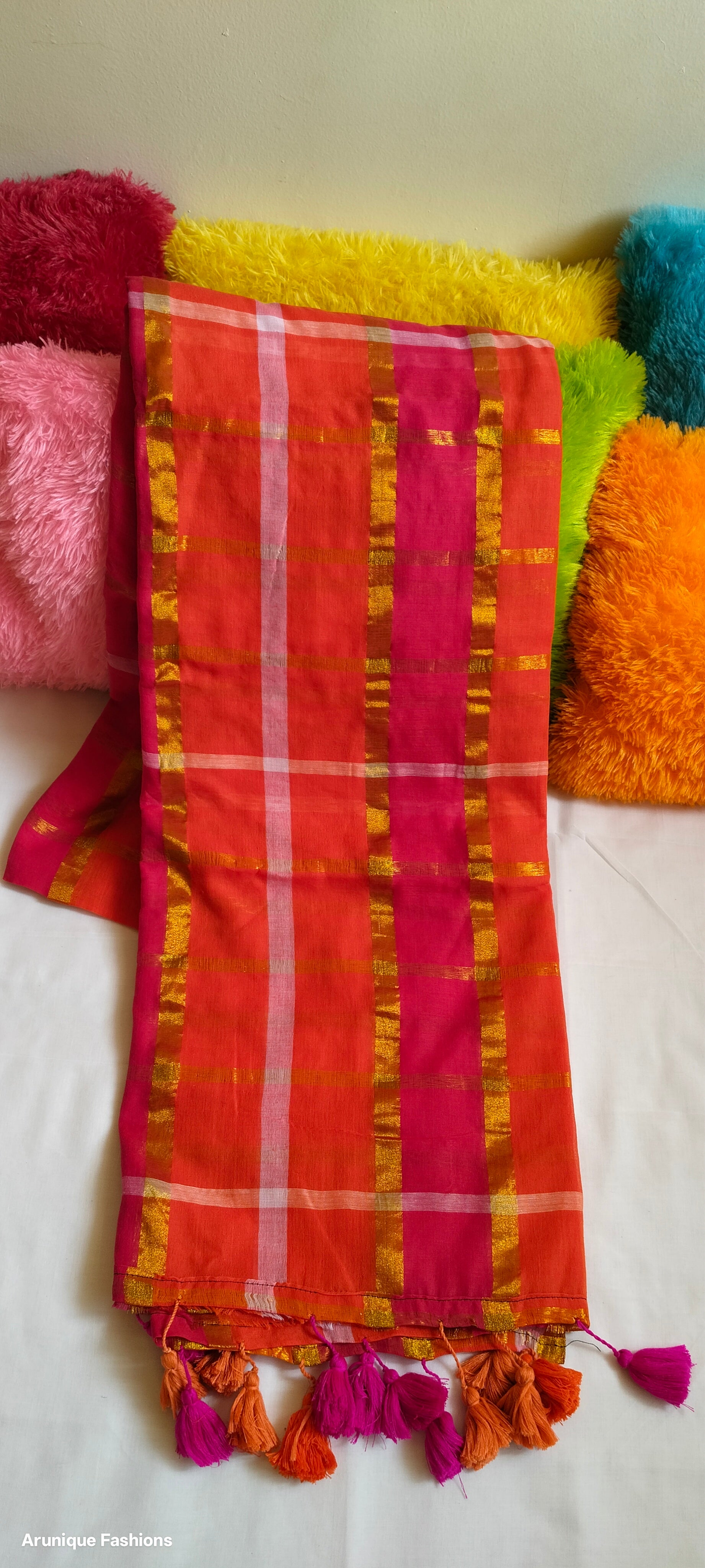 Orange and Pink Checks With Zari Mul Cotton Saree - Close-up View With Pillows In Background
