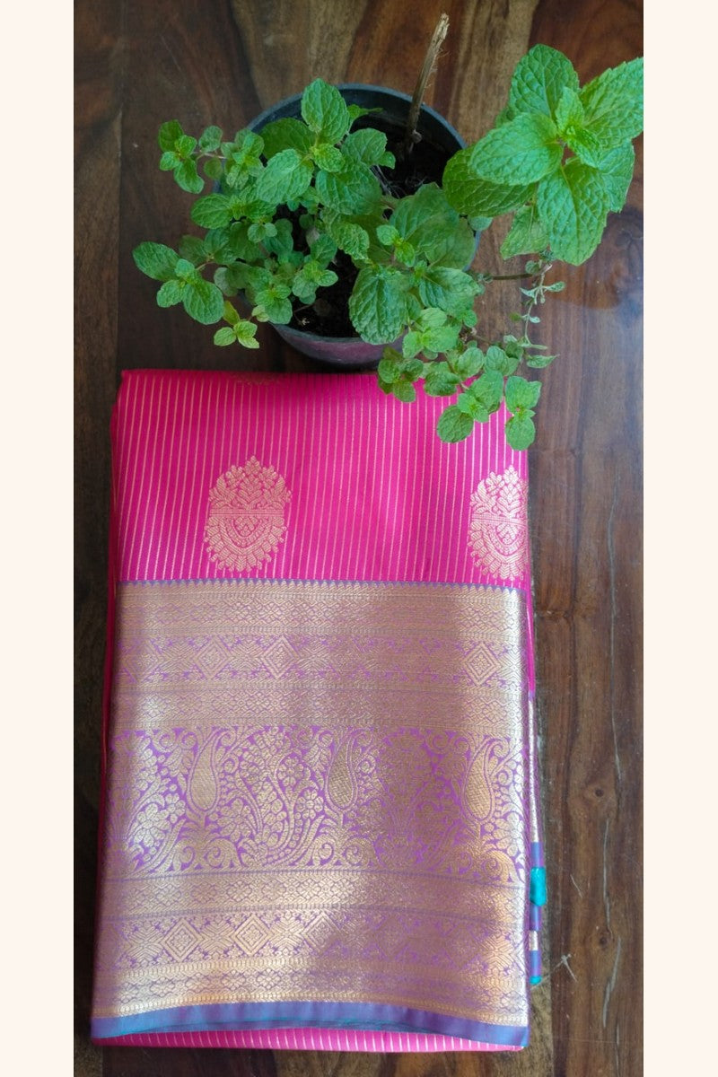 Teal Pink Saree with Golden Zari Butta & Wide Border - Saree on Table View