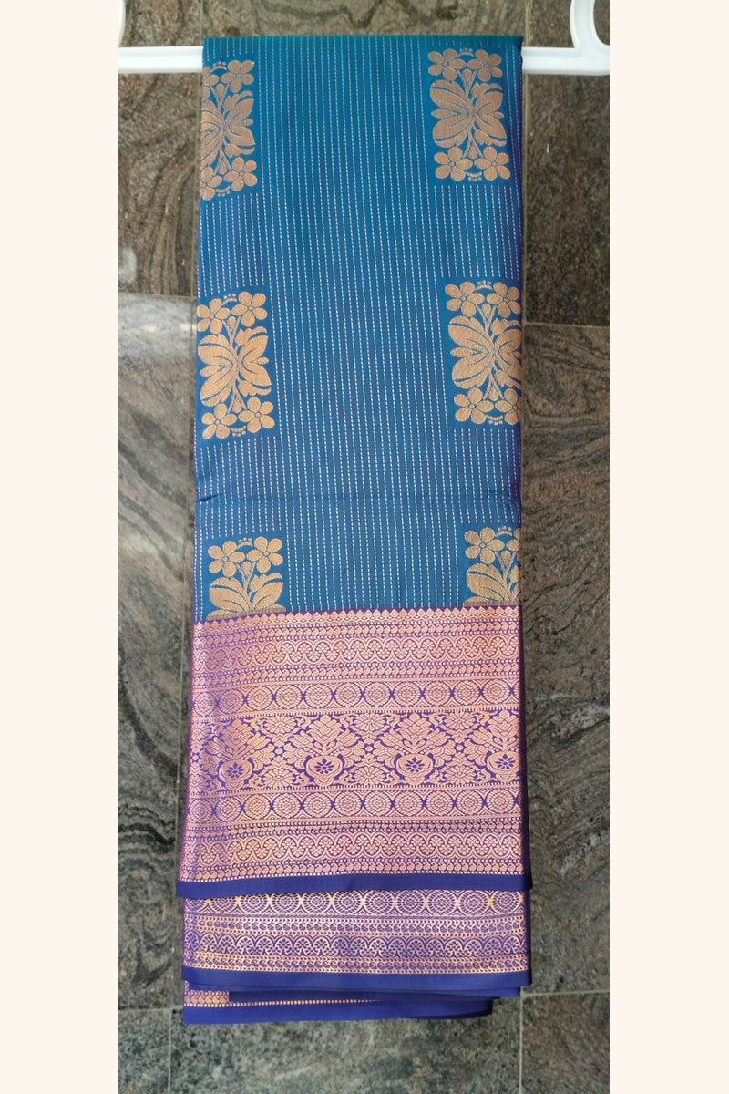 Turquoise Blue Saree with Golden Floral Butta & Purple Pink Zari Pallu - Saree on Hanger View