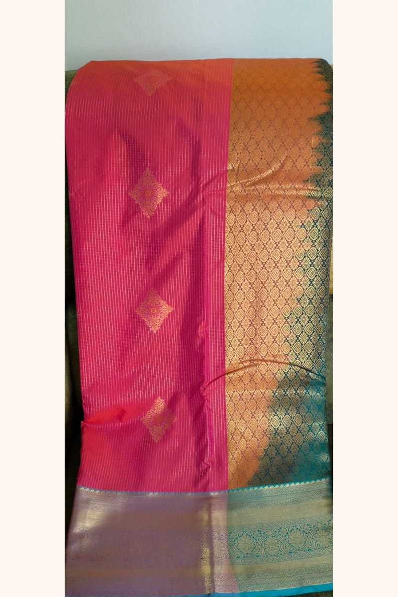 Pallu with body display of vibrant pink semi-silk saree