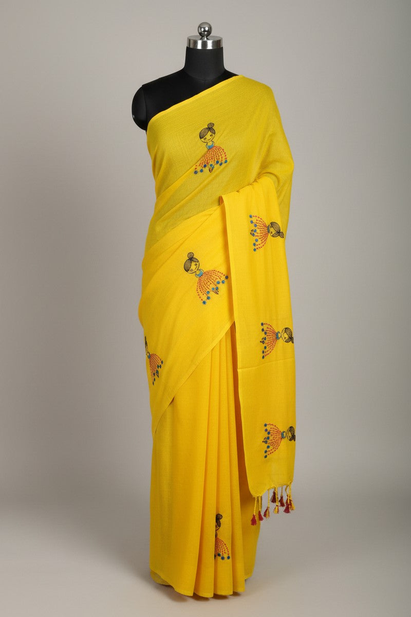 Mannequin display of yellow baby doll motif khadi saree